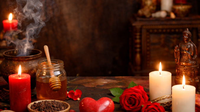 Un rituel d’amour préparé avec soin : bougies allumées, miel, clous de girofle et pétales de rose pour éloigner toute rivalité et protéger la relation.